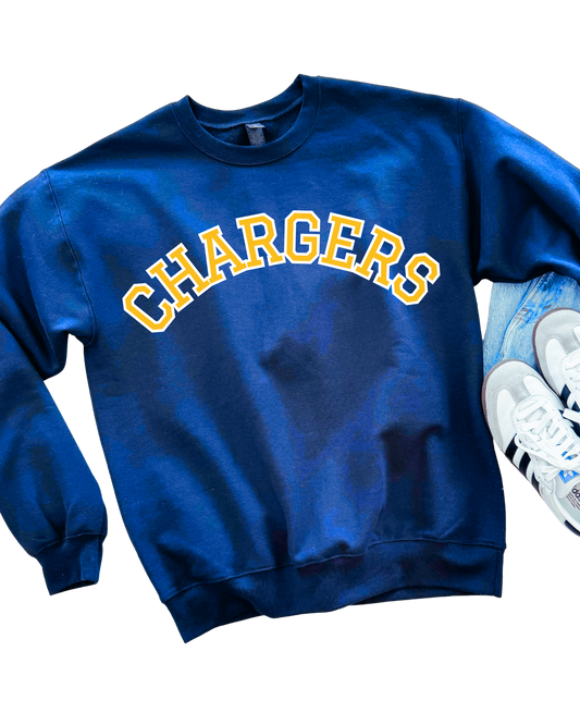 Blue sweatshirt with 'CHARGERS' text and white sneakers on a white background