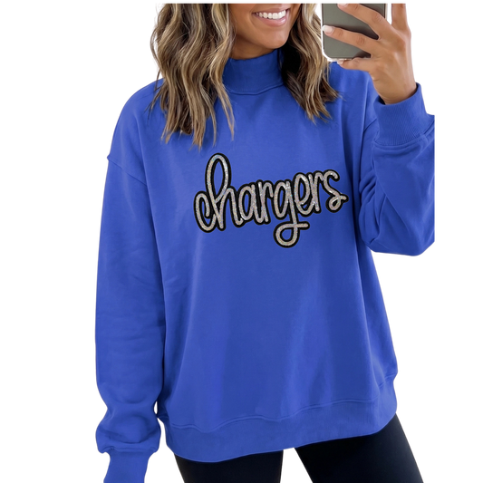 Blue sweatshirt with 'chargers' text worn by a person on a white background