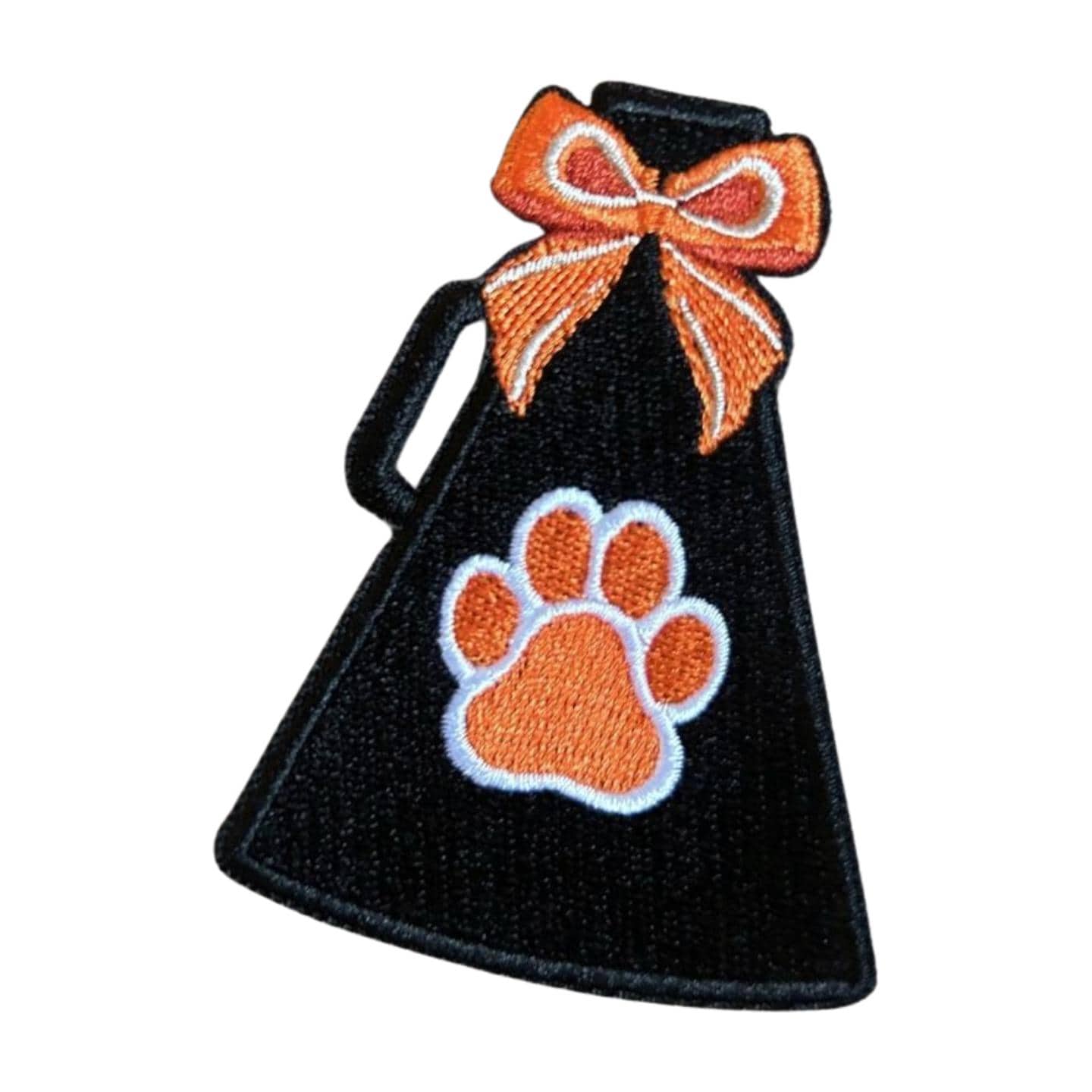 black megaphone with orange paw print and orange bow