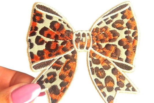 Leopard Print Bow Iron-On Patch: Orange Animal Print, 2 inch