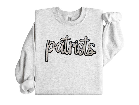Gray sweatshirt with 'patriots' text on a white background