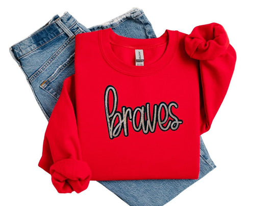 Red sweatshirt with 'braves' text on a white background